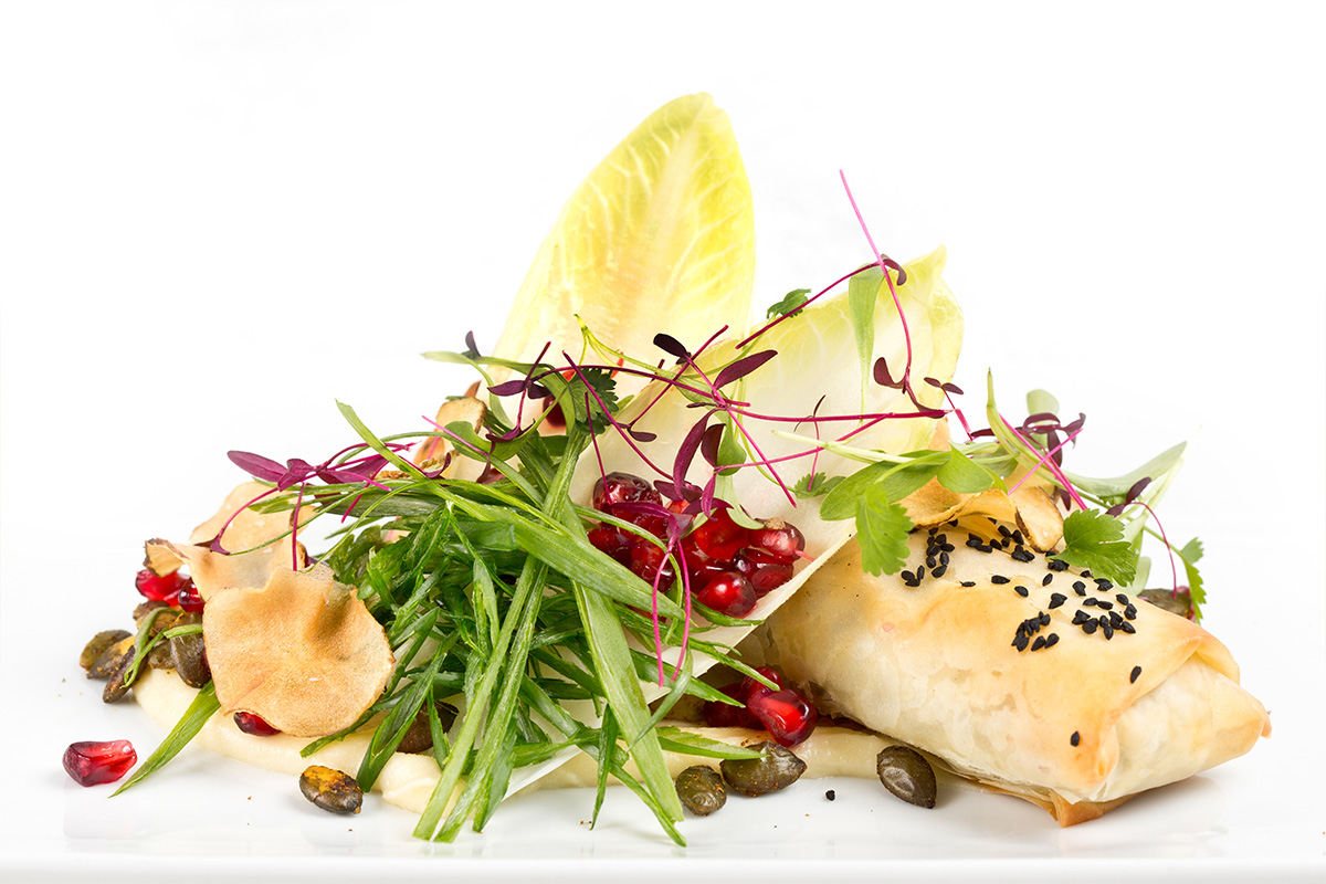 Pomegranate quinoa pastry, chargrilled artichoke heart, pickled chicory, Jerusalem artichoke puree