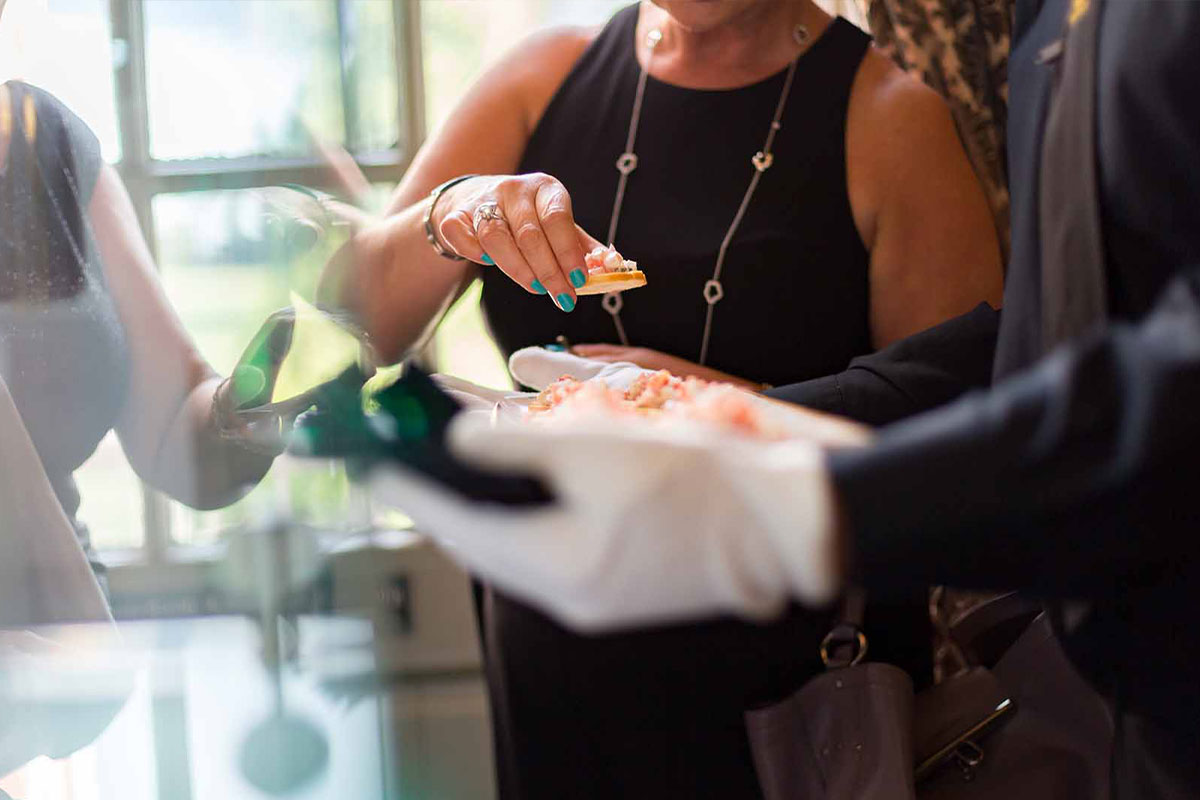 Canapes being served at a glamourous corporate event at Knowsley Hall.