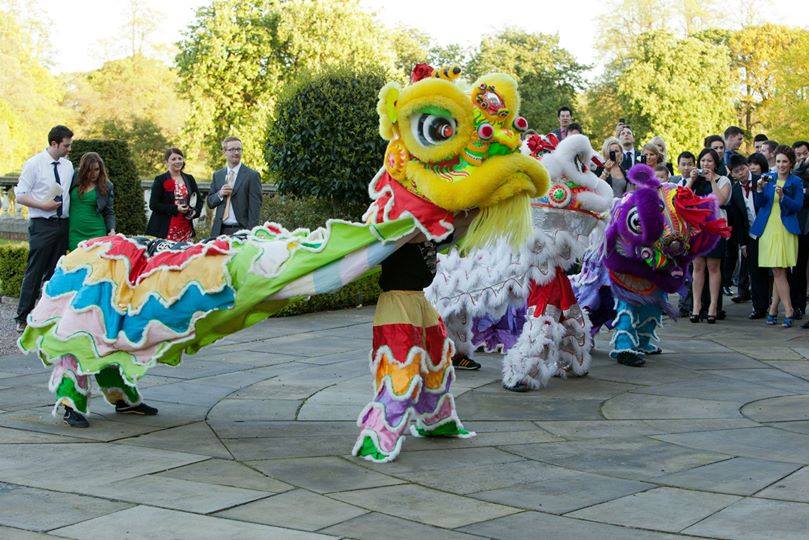 A Chinese Dragon outside in the gardens of Knowsley Hall for a Chinese wedding